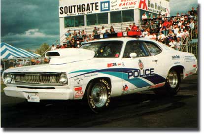 1972 Plymouth Duster - Police department using Amsoil synthetic motor oil to win drag races