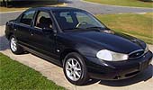 Suggested oil change belonging to 2000 CONTOUR vehicle