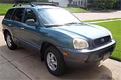Suggested oil change belonging to 2002 SANTA FE vehicle