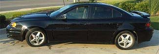 Suggested oil change belonging to 2002 GRAND AM vehicle