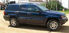 Suggested oil change belonging to 2003 GRAND CHEROKEE vehicle
