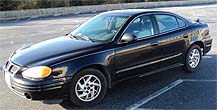 Suggested oil change belonging to 2003 GRAND AM vehicle