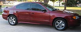 Suggested oil change belonging to 2003 GRAND AM vehicle