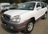 Suggested oil change belonging to 2004 SANTA FE vehicle