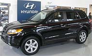 Suggested oil change belonging to 2009 SANTA FE vehicle