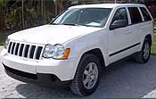 Suggested oil change belonging to 2009 GRAND CHEROKEE vehicle