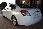 Suggested oil change belonging to 2010 ALTIMA HYBRID vehicle